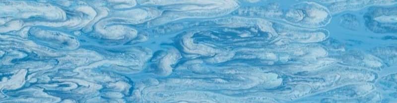 Abstract blue and white swirling patterns